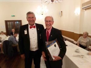 Kevin Hunter presents Ian Barnes with his award