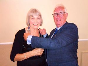 Darlington Lions President Pat De Martino (left) receives the chain of office from Lions Past President Tony Gent