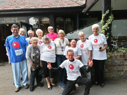 Members of Breathe Easy with Darlington Lions President Pat De Martino (centre, wearing her chain of office) outside The Copper Beech Pub